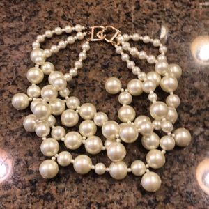 Multi strand off white necklace